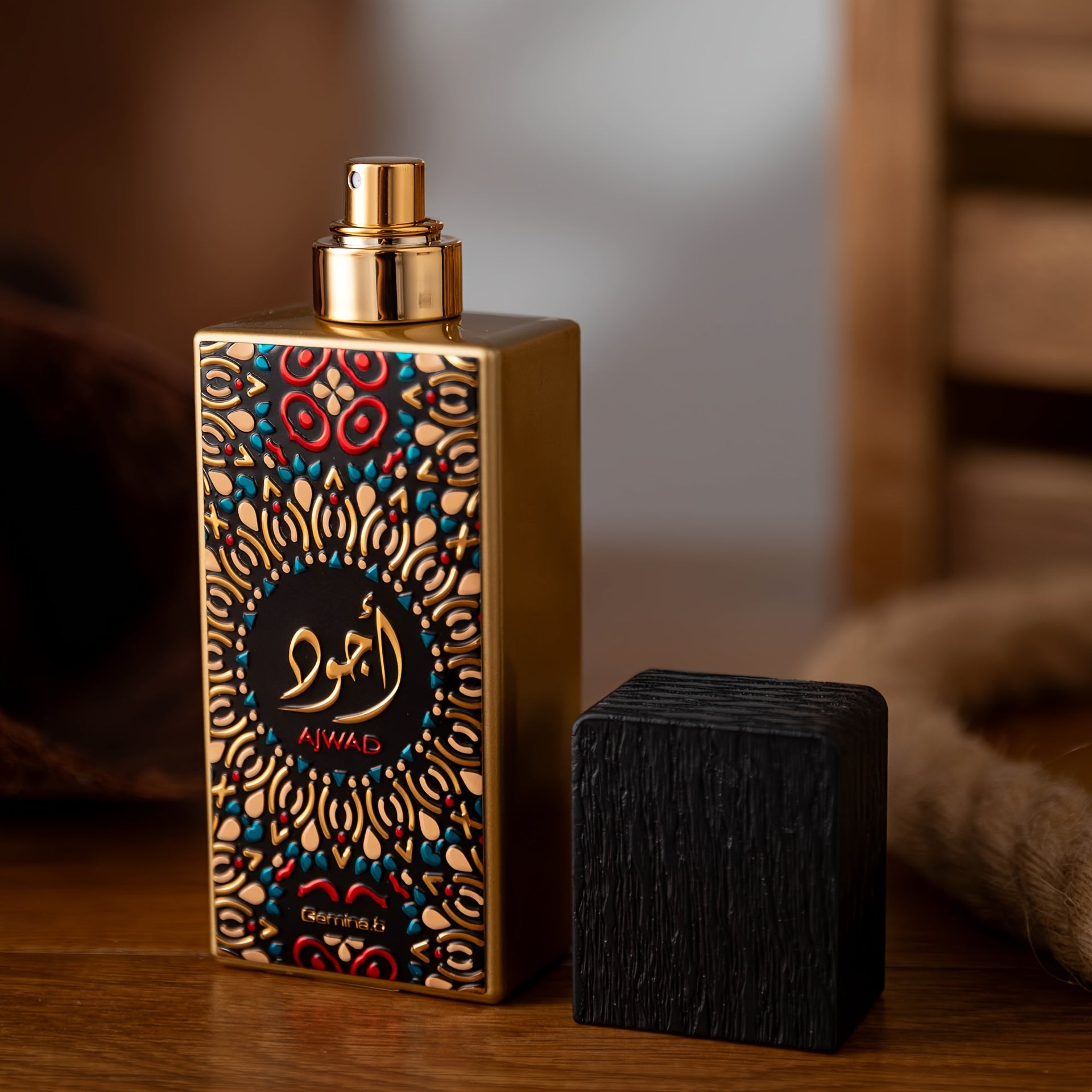 Decorative perfume bottle with intricate design on a wooden surface