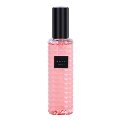 Pink bottle with black cap on a white background